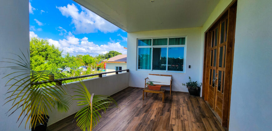 Upscale Two-Bedroom Rental with Expansive Veranda