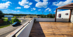Upscale Two-Bedroom Rental with Expansive Veranda