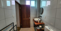 Upscale Two-Bedroom Rental with Expansive Veranda