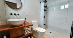 Upscale Two-Bedroom Rental with Expansive Veranda