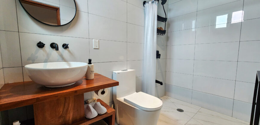 Upscale Two-Bedroom Rental with Expansive Veranda