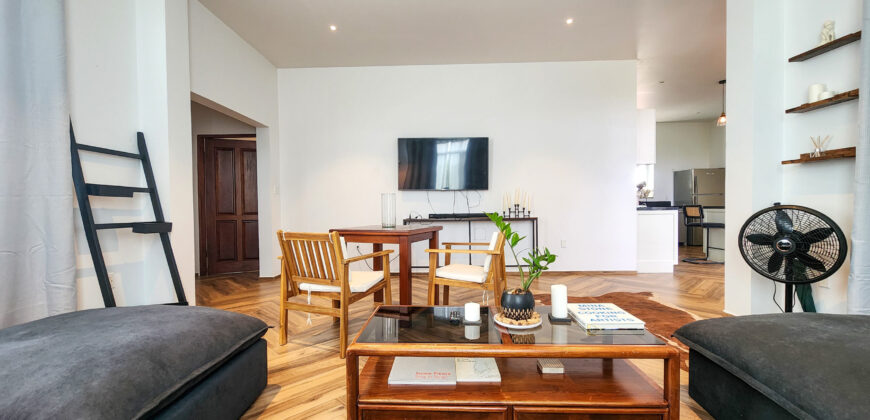 Upscale Two-Bedroom Rental with Expansive Veranda