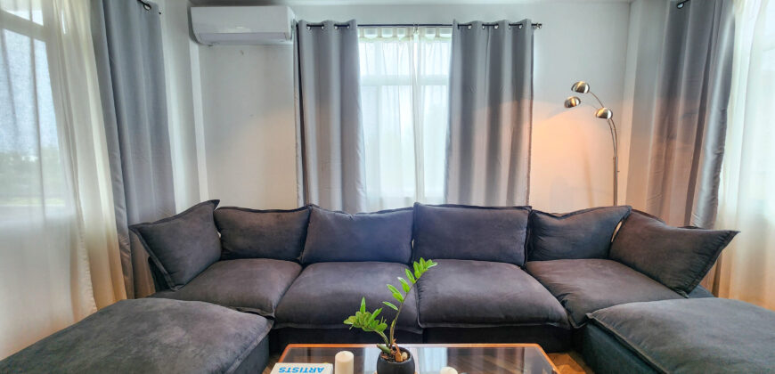 Upscale Two-Bedroom Rental with Expansive Veranda