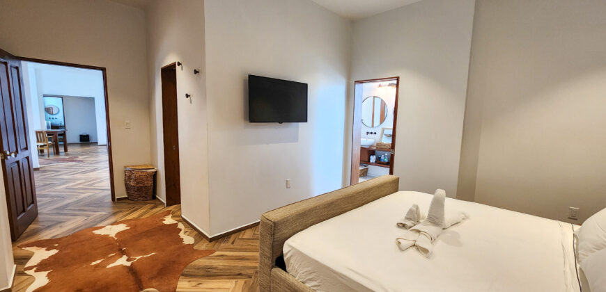 Upscale Two-Bedroom Rental with Expansive Veranda