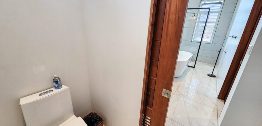 Upscale Two-Bedroom Rental with Expansive Veranda