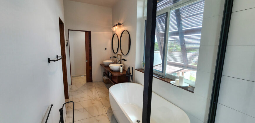 Upscale Two-Bedroom Rental with Expansive Veranda