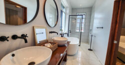 Upscale Two-Bedroom Rental with Expansive Veranda