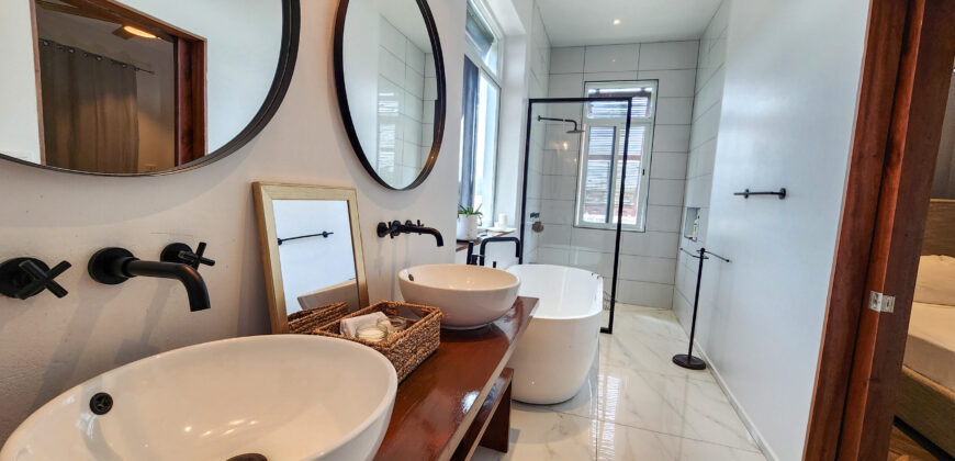 Upscale Two-Bedroom Rental with Expansive Veranda