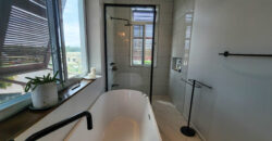 Upscale Two-Bedroom Rental with Expansive Veranda
