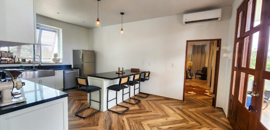 Upscale Two-Bedroom Rental with Expansive Veranda