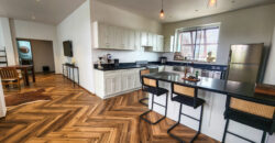 Upscale Two-Bedroom Rental with Expansive Veranda