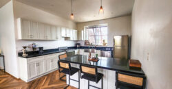 Upscale Two-Bedroom Rental with Expansive Veranda