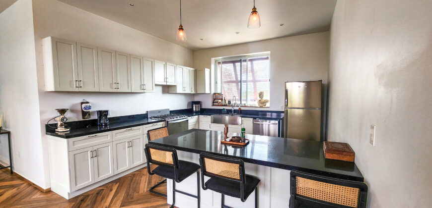 Upscale Two-Bedroom Rental with Expansive Veranda