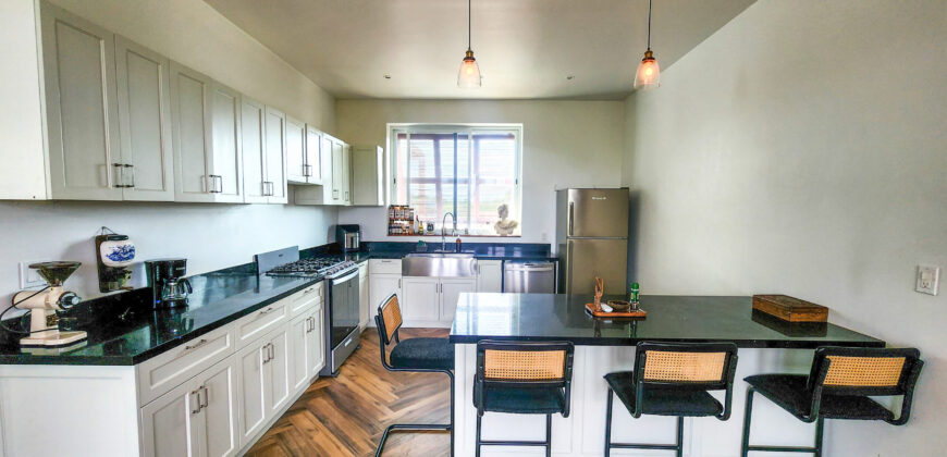 Upscale Two-Bedroom Rental with Expansive Veranda
